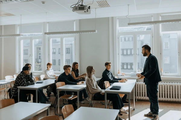 Education consultant meeting with students