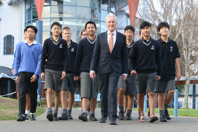 Five Brothers team meeting with students